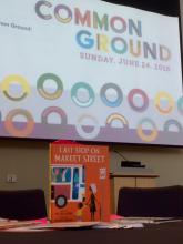 Screen projector that reads Common Ground Sunday. June 24. 2018