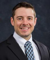 White man in business attire 