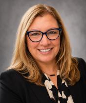 Headshot of Laura McNally