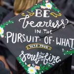 Photo of graduation cap decorated with a message for students to follow their passions