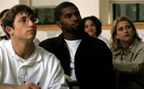 students looking like they are listening to a speaker