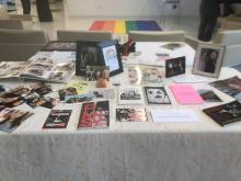 Photograph of exhibit table from Queer Love art installation