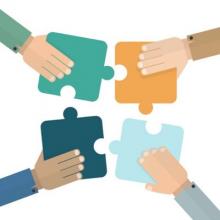 Cartoon hands putting puzzle together