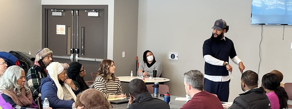 Group of students sitting at tables