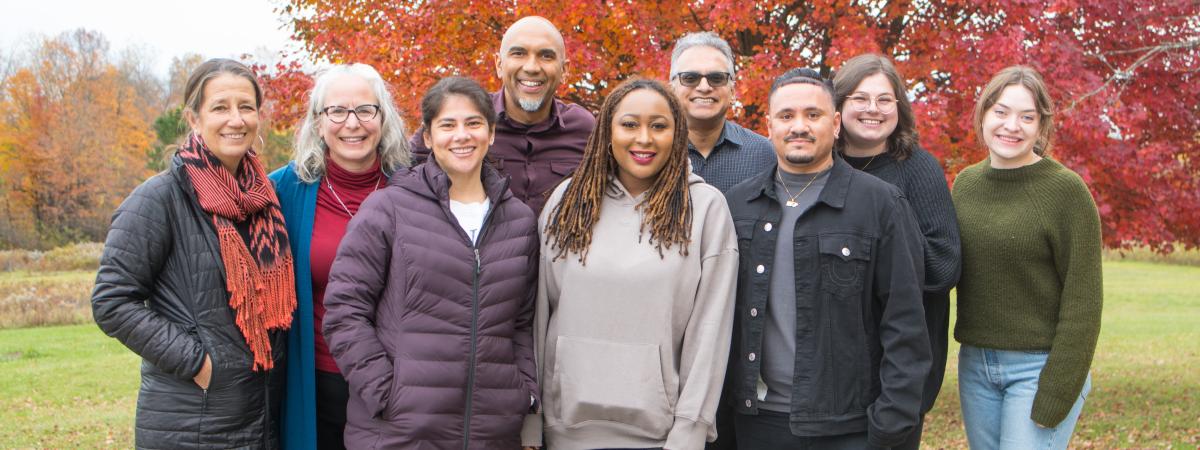 group of people posing for camera