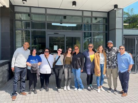 group of adults posing for camera