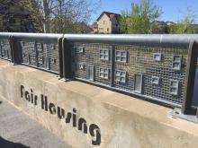 Bridge with "fair housing" carved into stonework