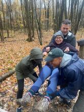 group of adults playing a teamwork game