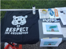 T-shirt being designed with respect the groundhog as a logo