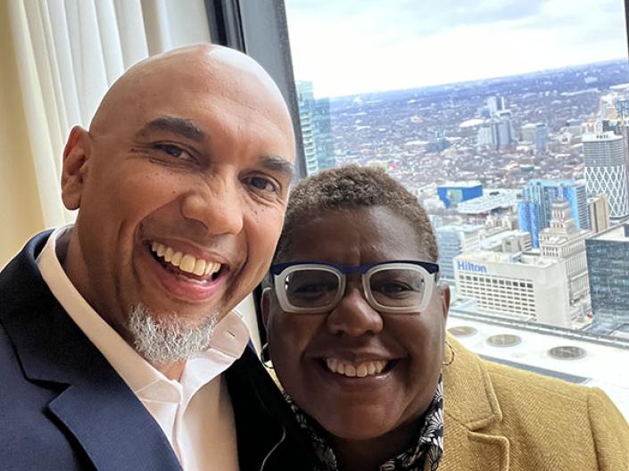 Mark Joseph and partner posing for the camera