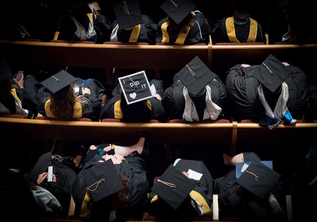 looking down at the tops of graduate caps