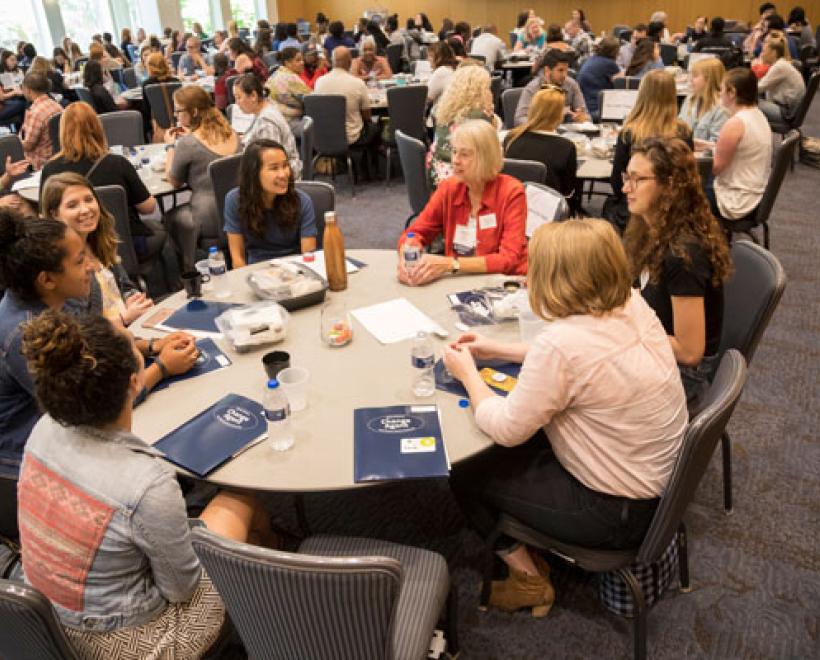 Tables of students at orientation