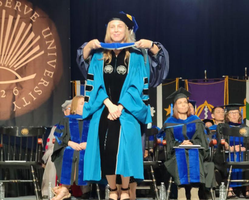Anna Bender gets her PhD hood