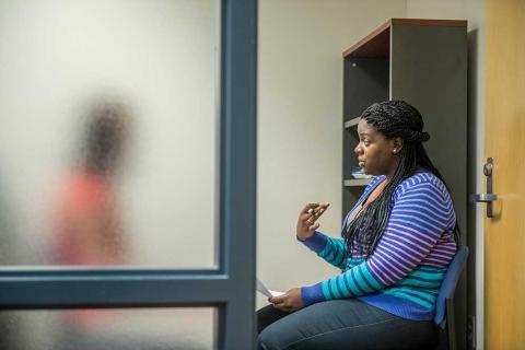 Student interviews client
