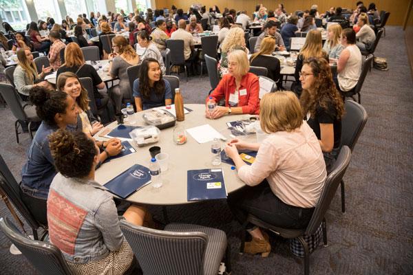 Tables of students at orientation