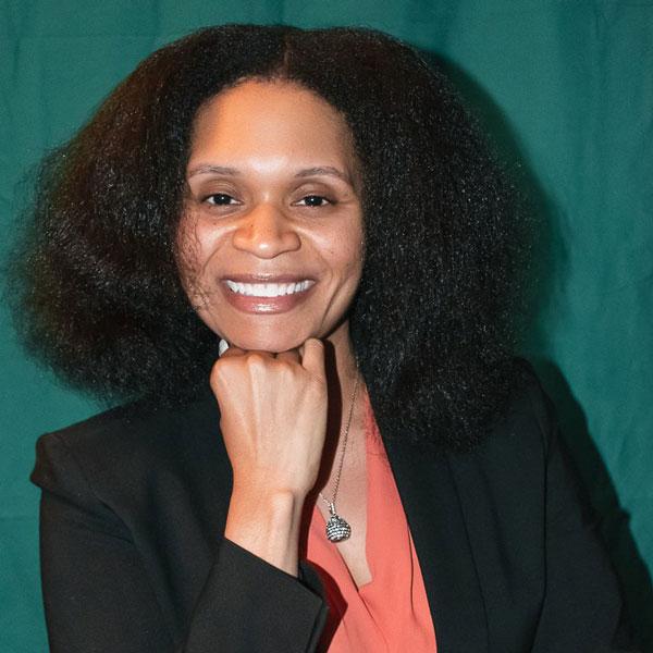 Ada Jackson with her hand on her chin