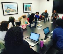 students sitting at large table