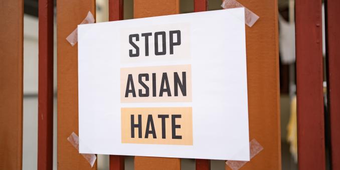 Stop Asian Hate sign on a fence