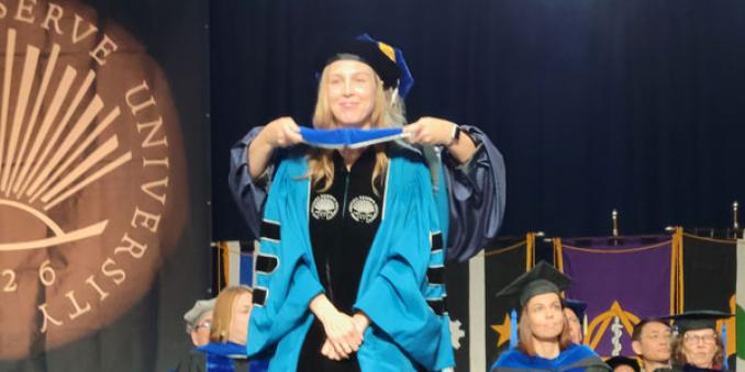 Anna Bender gets her PhD hood