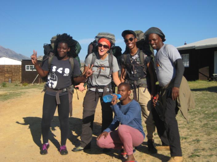 Group of college students posing for camera