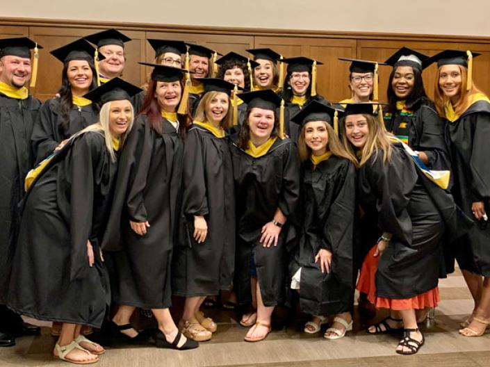 Group of 2022 graduates smiling