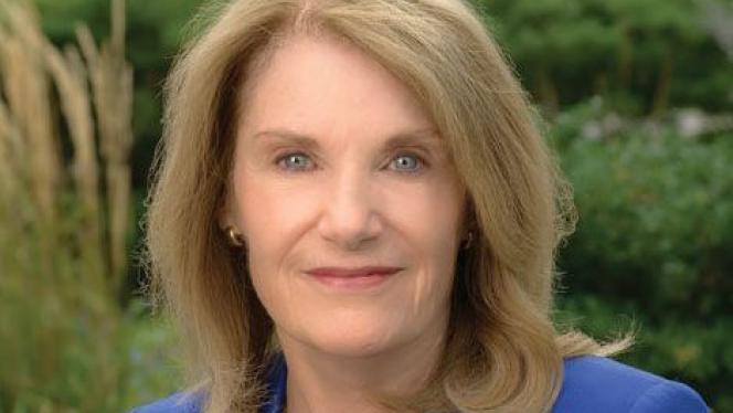 headshot of Claudia J. Coulton