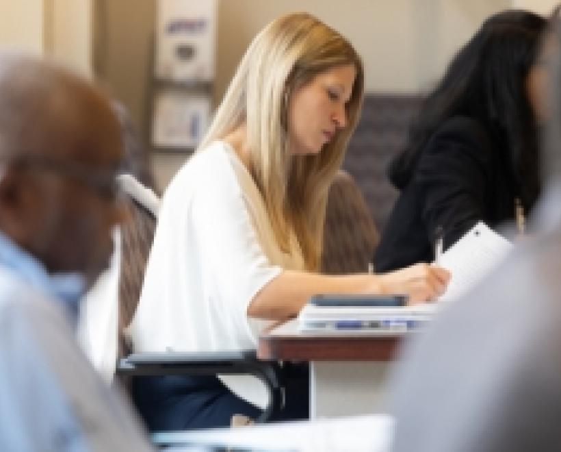 Female student at a table studying
