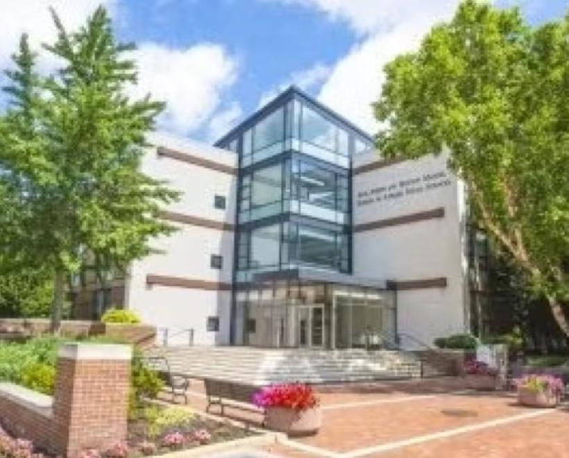 Image of outside photo of Jack, Joseph and Morton Mandel School of Applied Social Sciences with trees and front plaza with steps