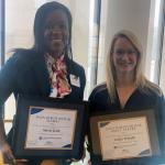 Anycia Grady and Jessica Wojtalik hold their Innovator of the Year awards