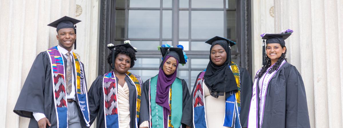 Group of graduates standing for the camera