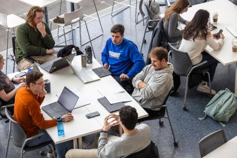 Group of students sitting around a table