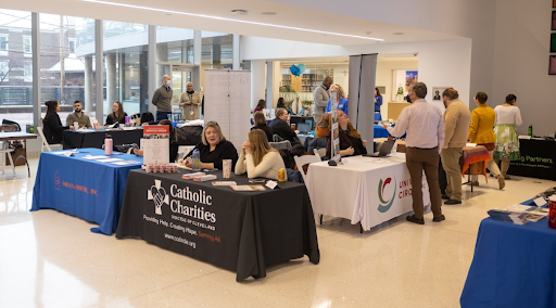 group of tables with different field education groups in Noble Commons