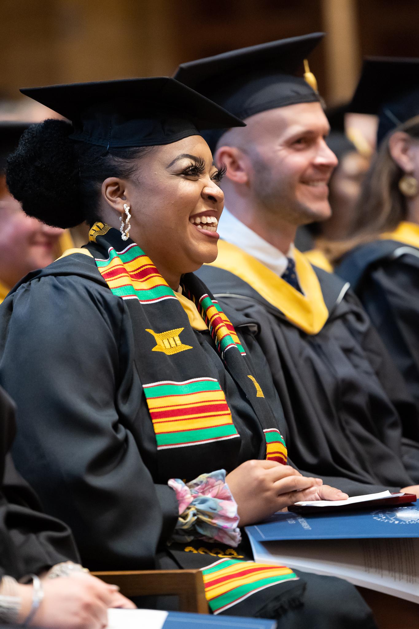 Graduating student profile smiling during commencement