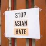 Stop Asian Hate sign on a fence
