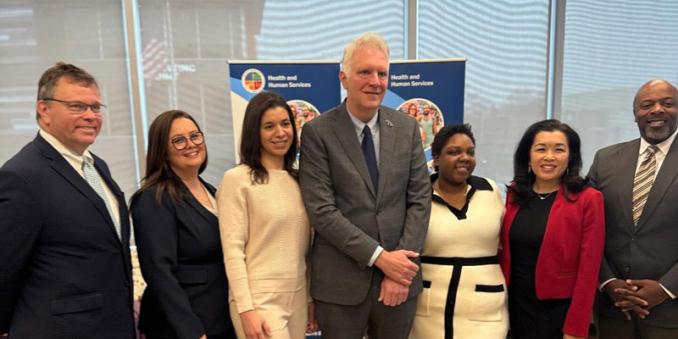 Angela Newman-White stands with county leaders, medical experts and community partners after presenting the findings of the 2023 Child Fatality Report