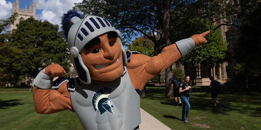 Photo of Case Western Reserve University Spartan mascot, Spartie, flexing