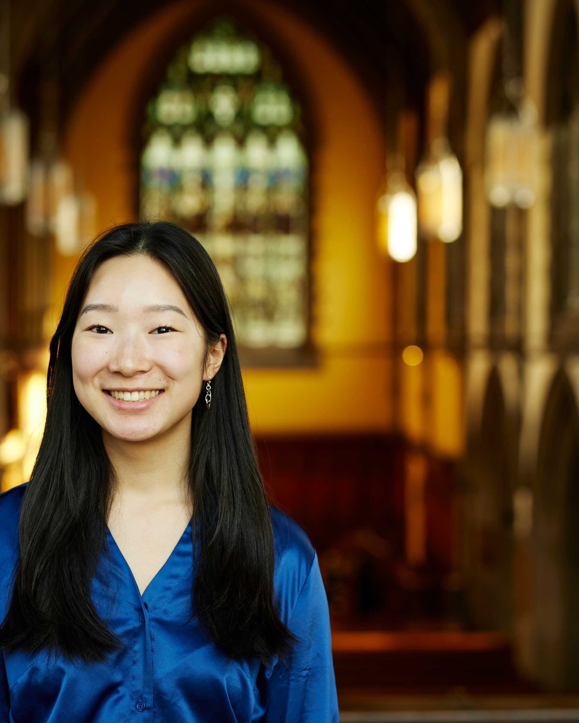 Portrait of Case Western Reserve University student Amy Che in Amasa Stone Chapel