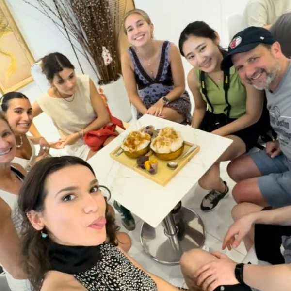  group of students taking a selfie at a cafe in Taiwan.