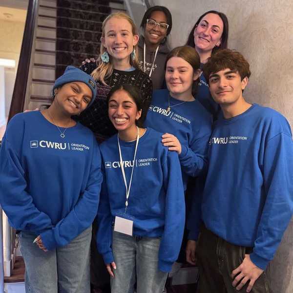 Seven orientation leaders pose for a photo.