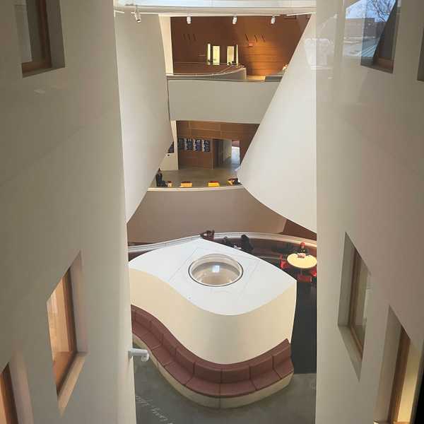 An interior photo of the Peter B. Lewis Building’s unique levels and curving white walls.