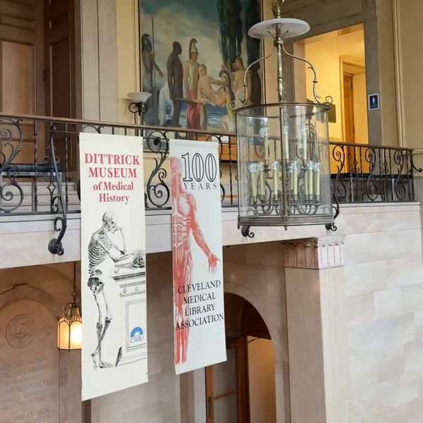 A balcony with banners inside the Allen Memorial Medical Library.