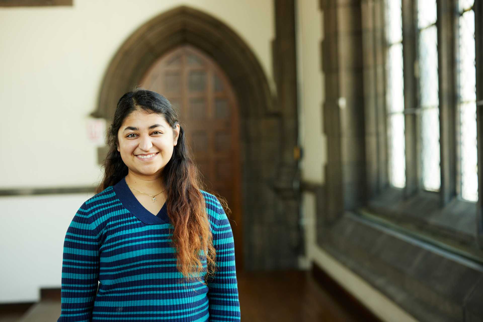 Portrait of Case Western Reserve University student Megha Dalal in Amasa Stone Chapel