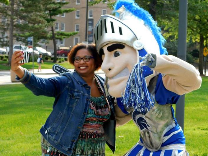 Associate Director of Leadership Programs, Leah Shaw, takes a selfie with Spartie.