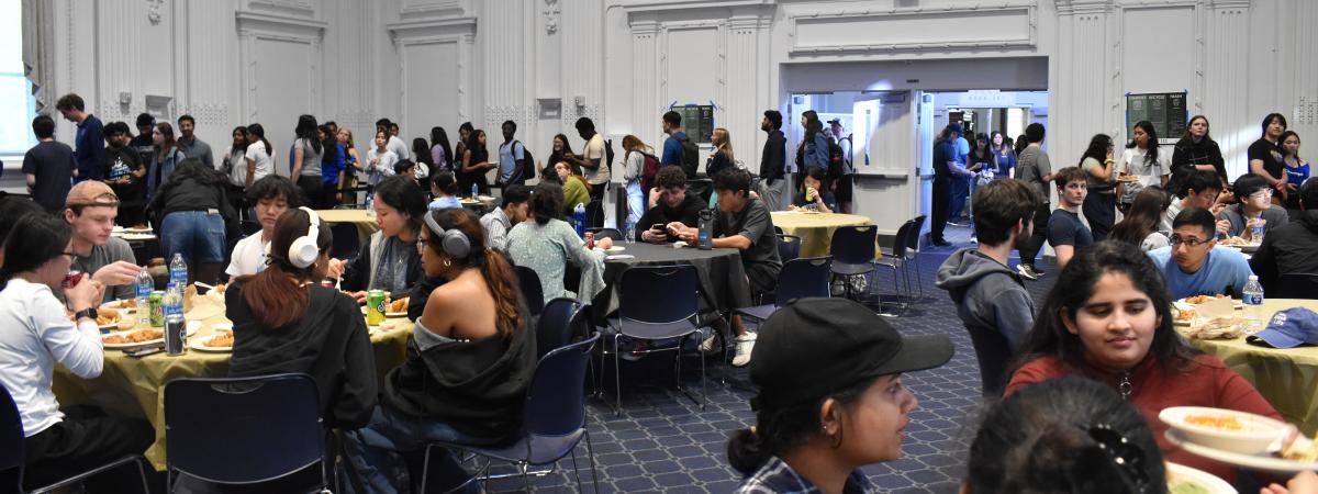 Students eating in Thwing Ballroom during Thwing Study Over