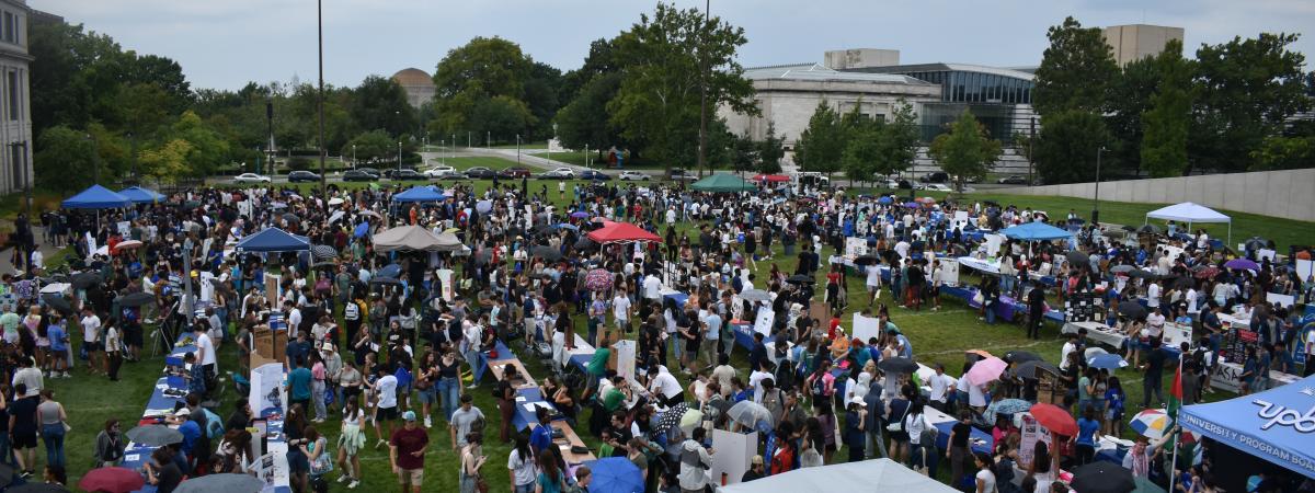 large field with hundreds of students 
