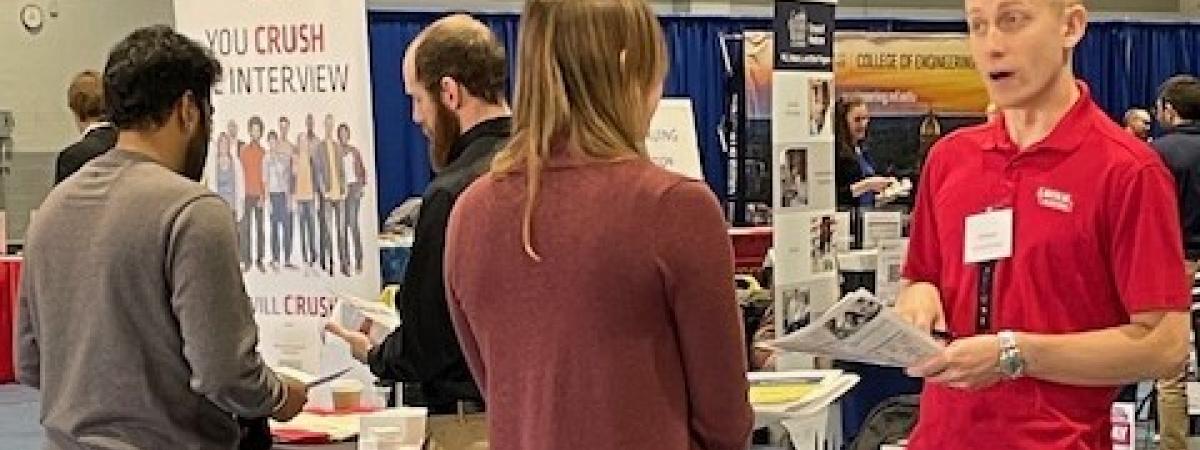 Lincoln Electric recruiter talking with students