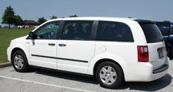 White CCEL mini van