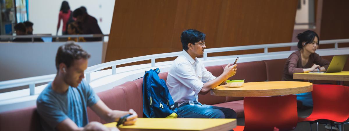 Students study at tables in the Peter B Lewis Building