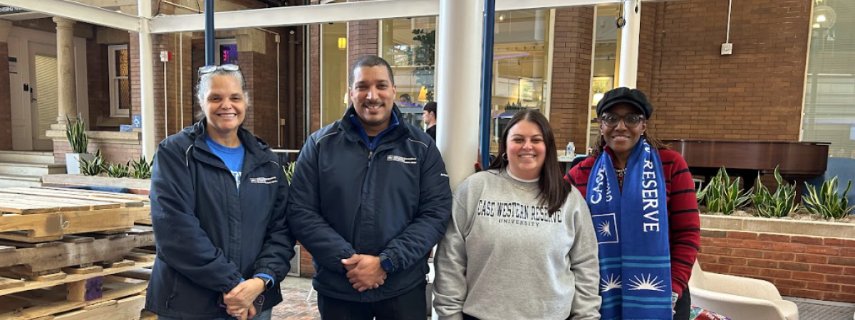 Four people standing together at the Mobile Food Pantry Spring 2025