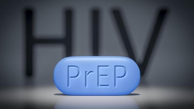 blue pill with PrEP written on it. HIV in background. 